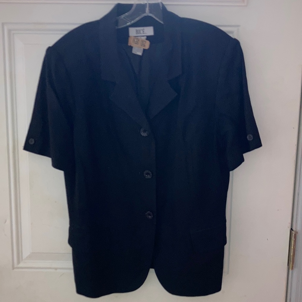 A Black blazer suite in woman’s Size 14.